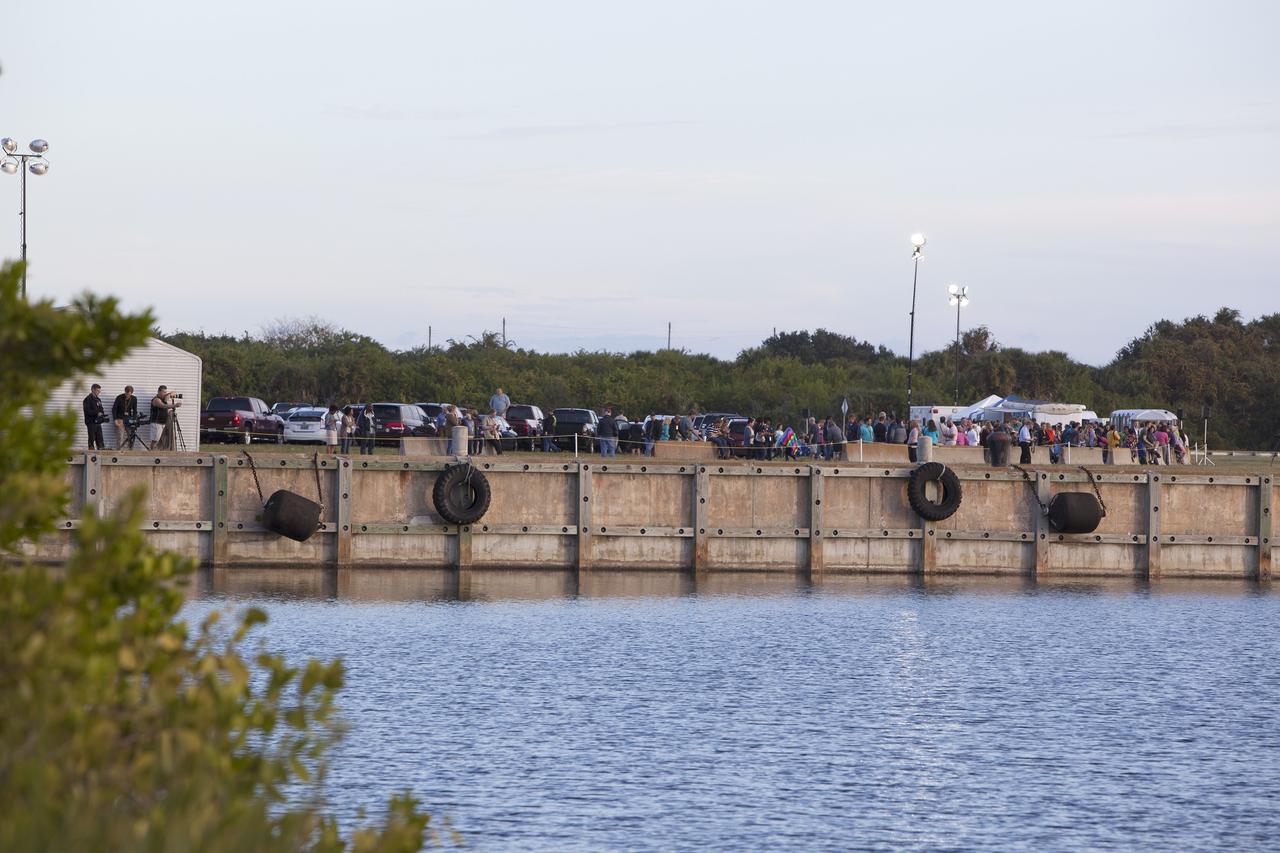 CAPE CANAVERAL, Fla. – At NASA's Kennedy Space Center in Florida, news media and other guests gather in anticipation of the launch of NASA's Orion spacecraft atop a United Launch Alliance Delta IV Heavy rocket. For more information, visit www.nasa.gov/orion Photo credit: NASA/Frankie Martin