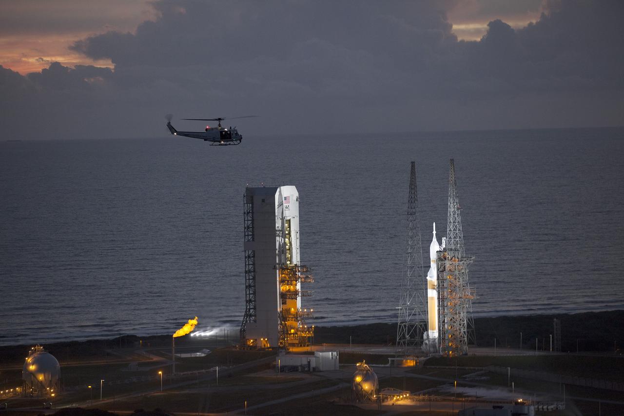 CAPE CANAVERAL, Fla. – This helicopter view of Space Launch Complex 37 at Cape Canaveral Air Force Station in Florida shows the United Launch Alliance Delta IV Heavy rocket as it stands ready to boost NASA's Orion spacecraft on a 4.5-hour mission. The liftoff was postponed because of an issue related to fill and drain valves on the Delta IV Heavy rocket that teams could not troubleshoot by the time the launch window expired. For more information, visit www.nasa.gov/orion Photo credit: NASA/Kim Shiflett