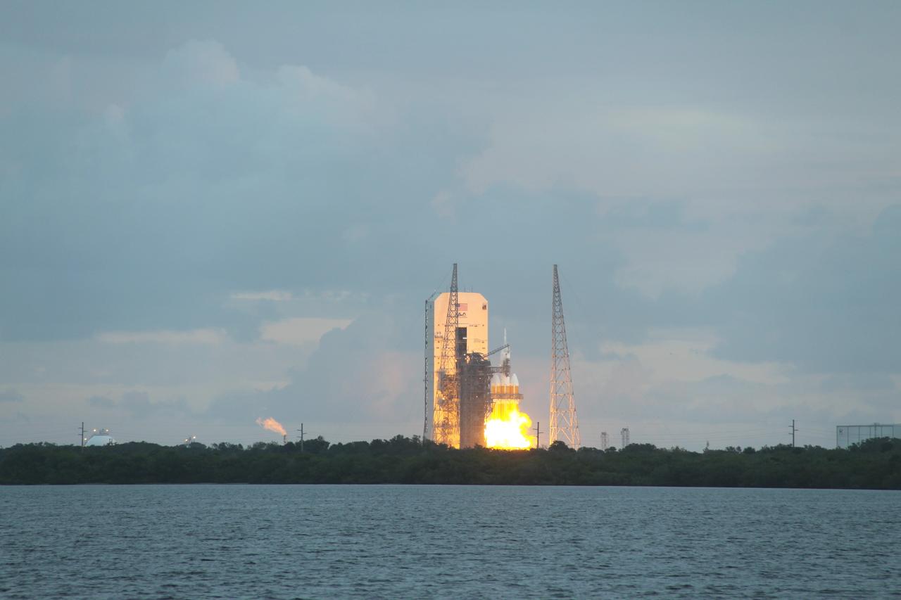 CAPE CANAVERAL, Fla. -- A Delta IV Heavy rocket lifts off from Space Launch Complex 37 at Cape Canaveral Air Force Station in Florida carrying NASA's Orion spacecraft on an unpiloted flight test to Earth orbit. Liftoff was at 7:05 a.m. EST. During the two-orbit, four-and-a-half hour mission, engineers will evaluate the systems critical to crew safety, the launch abort system, the heat shield and the parachute system. For more information, visit www.nasa.gov/orion Photo credit: NASA/Jim Grossman