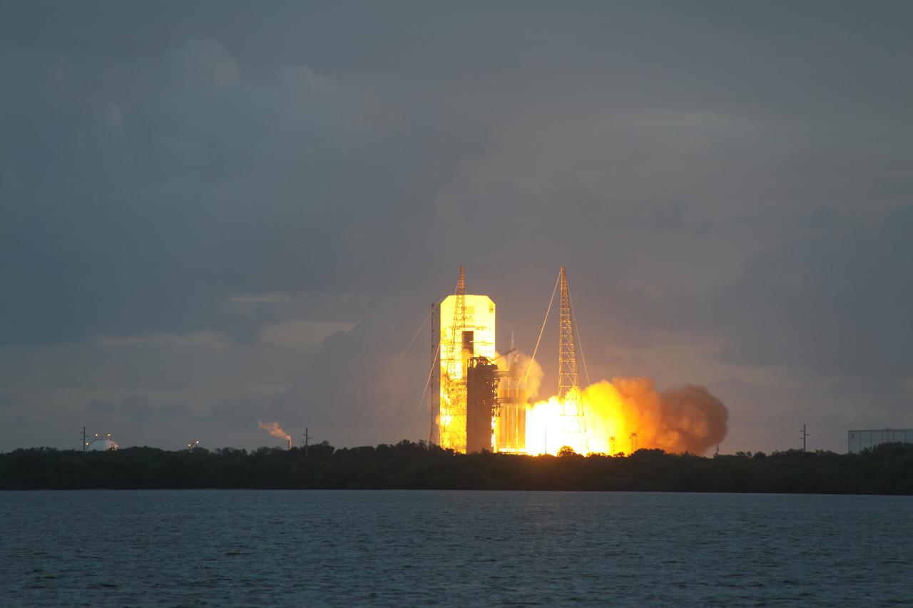 CAPE CANAVERAL, Fla. -- A Delta IV Heavy rocket lifts off from Space Launch Complex 37 at Cape Canaveral Air Force Station in Florida carrying NASA's Orion spacecraft on an unpiloted flight test to Earth orbit. Liftoff was at 7:05 a.m. EST. During the two-orbit, four-and-a-half hour mission, engineers will evaluate the systems critical to crew safety, the launch abort system, the heat shield and the parachute system. For more information, visit www.nasa.gov/orion Photo credit: NASA/Jim Grossman
