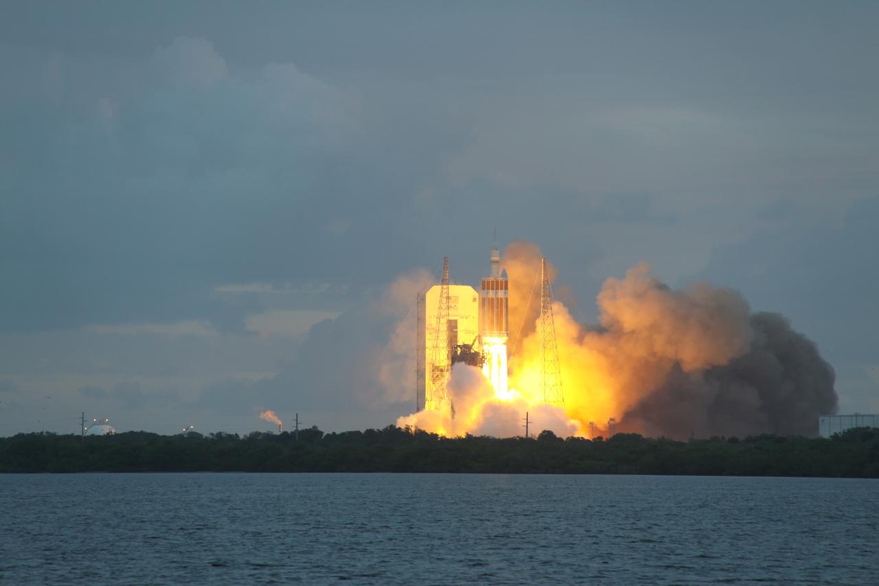 CAPE CANAVERAL, Fla. -- A Delta IV Heavy rocket lifts off from Space Launch Complex 37 at Cape Canaveral Air Force Station in Florida carrying NASA's Orion spacecraft on an unpiloted flight test to Earth orbit. Liftoff was at 7:05 a.m. EST. During the two-orbit, four-and-a-half hour mission, engineers will evaluate the systems critical to crew safety, the launch abort system, the heat shield and the parachute system. For more information, visit www.nasa.gov/orion Photo credit: NASA/Jim Grossman
