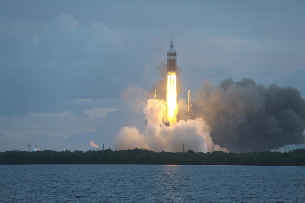 CAPE CANAVERAL, Fla. -- A Delta IV Heavy rocket lifts off from Space Launch Complex 37 at Cape Canaveral Air Force Station in Florida carrying NASA's Orion spacecraft on an unpiloted flight test to Earth orbit. Liftoff was at 7:05 a.m. EST. During the two-orbit, four-and-a-half hour mission, engineers will evaluate the systems critical to crew safety, the launch abort system, the heat shield and the parachute system. For more information, visit www.nasa.gov/orion Photo credit: NASA/Jim Grossman