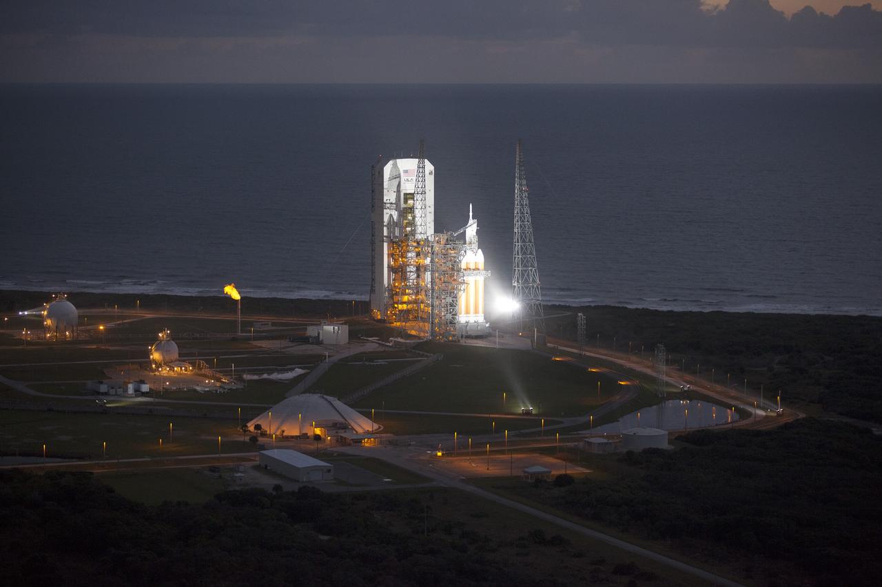 CAPE CANAVERAL, Fla. -- This helicopter view of Space Launch Complex 37 at Cape Canaveral Air Force Station in Florida shows the United Launch Alliance Delta IV Heavy rocket as it stands ready to boost NASA's Orion spacecraft on a 4.5-hour mission. For more information, visit www.nasa.gov/orion Photo credit: NASA/Kim Shiflett