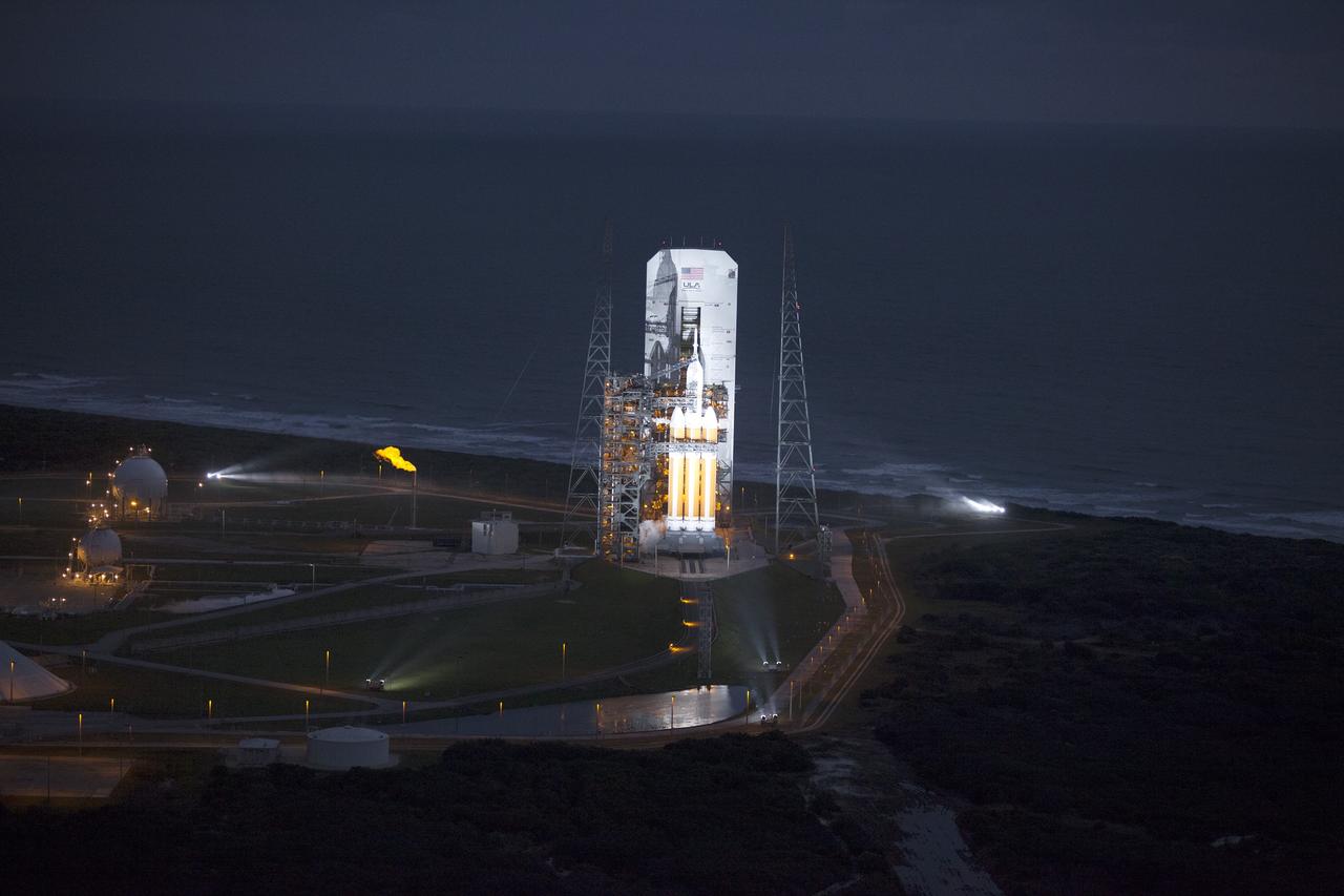 CAPE CANAVERAL, Fla. -- This helicopter view of Space Launch Complex 37 at Cape Canaveral Air Force Station in Florida shows the United Launch Alliance Delta IV Heavy rocket as it stands ready to boost NASA's Orion spacecraft on a 4.5-hour mission. For more information, visit www.nasa.gov/orion Photo credit: NASA/Kim Shiflett