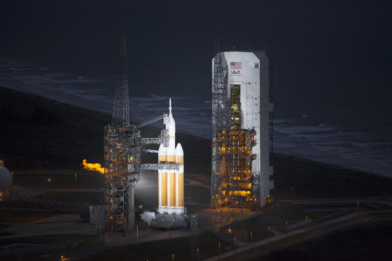 CAPE CANAVERAL, Fla. -- This helicopter view of Space Launch Complex 37 at Cape Canaveral Air Force Station in Florida shows the United Launch Alliance Delta IV Heavy rocket as it stands ready to boost NASA's Orion spacecraft on a 4.5-hour mission. For more information, visit www.nasa.gov/orion Photo credit: NASA/Kim Shiflett