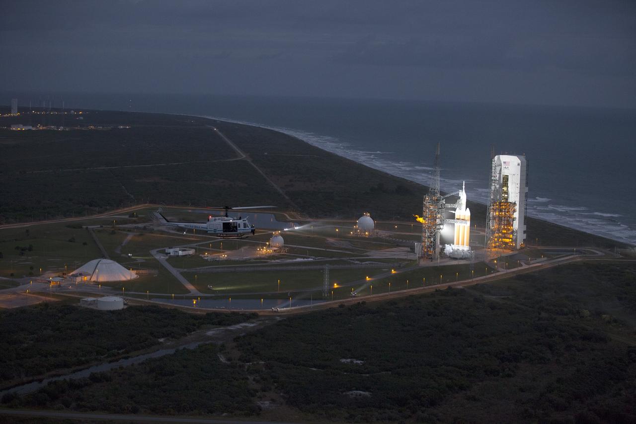 CAPE CANAVERAL, Fla. -- This helicopter view of Space Launch Complex 37 at Cape Canaveral Air Force Station in Florida shows the United Launch Alliance Delta IV Heavy rocket as it stands ready to boost NASA's Orion spacecraft on a 4.5-hour mission. For more information, visit www.nasa.gov/orion Photo credit: NASA/Kim Shiflett