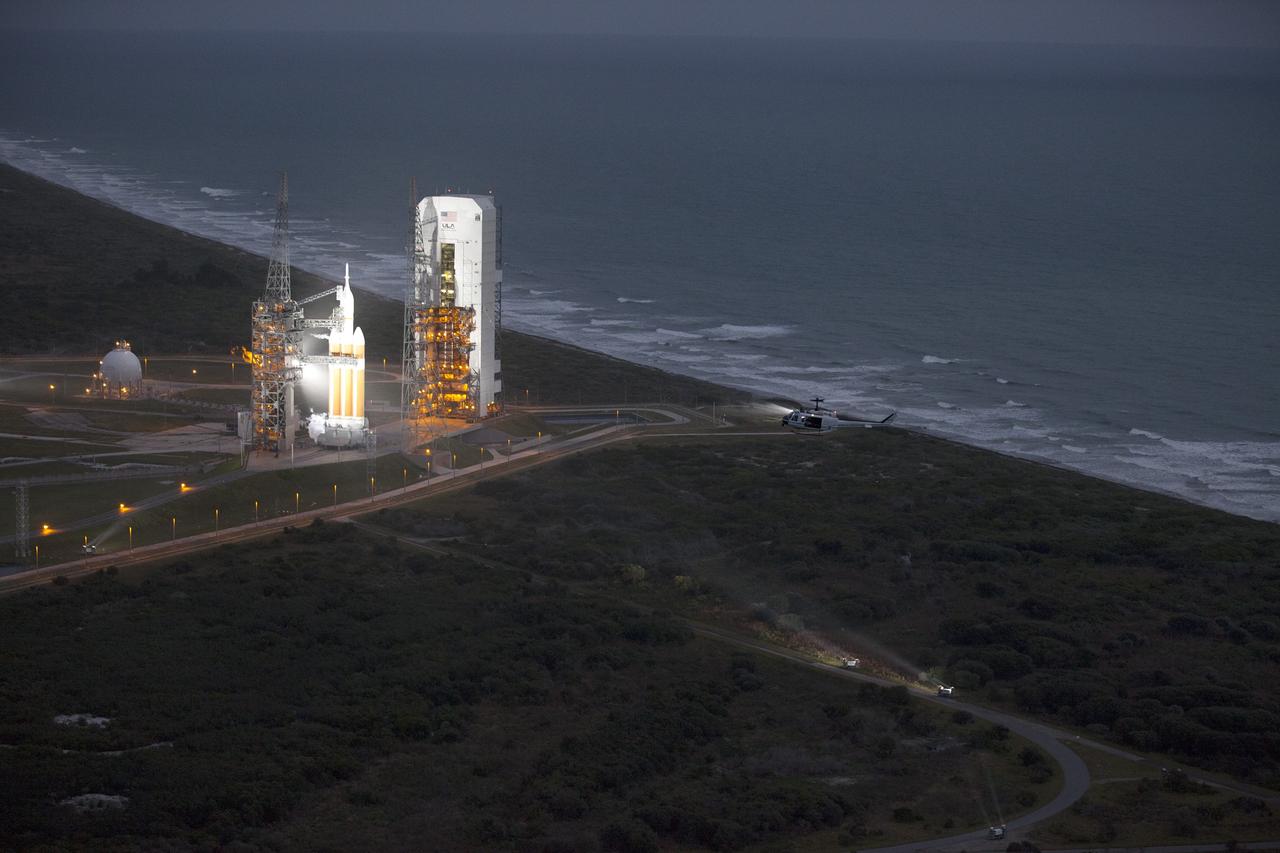 CAPE CANAVERAL, Fla. -- This helicopter view of Space Launch Complex 37 at Cape Canaveral Air Force Station in Florida shows the United Launch Alliance Delta IV Heavy rocket as it stands ready to boost NASA's Orion spacecraft on a 4.5-hour mission. For more information, visit www.nasa.gov/orion Photo credit: NASA/Kim Shiflett