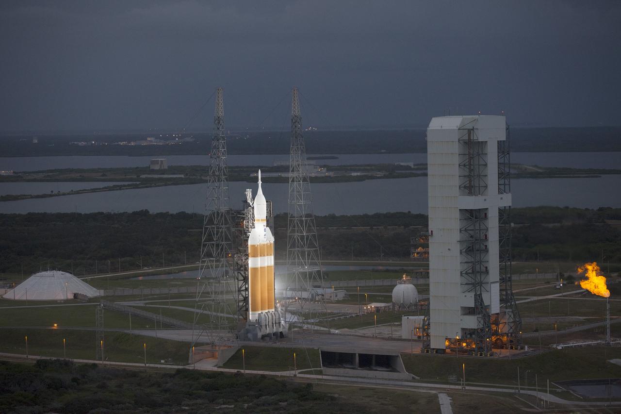 CAPE CANAVERAL, Fla. -- This helicopter view of Space Launch Complex 37 at Cape Canaveral Air Force Station in Florida shows the United Launch Alliance Delta IV Heavy rocket as it stands ready to boost NASA's Orion spacecraft on a 4.5-hour mission. For more information, visit www.nasa.gov/orion Photo credit: NASA/Kim Shiflett