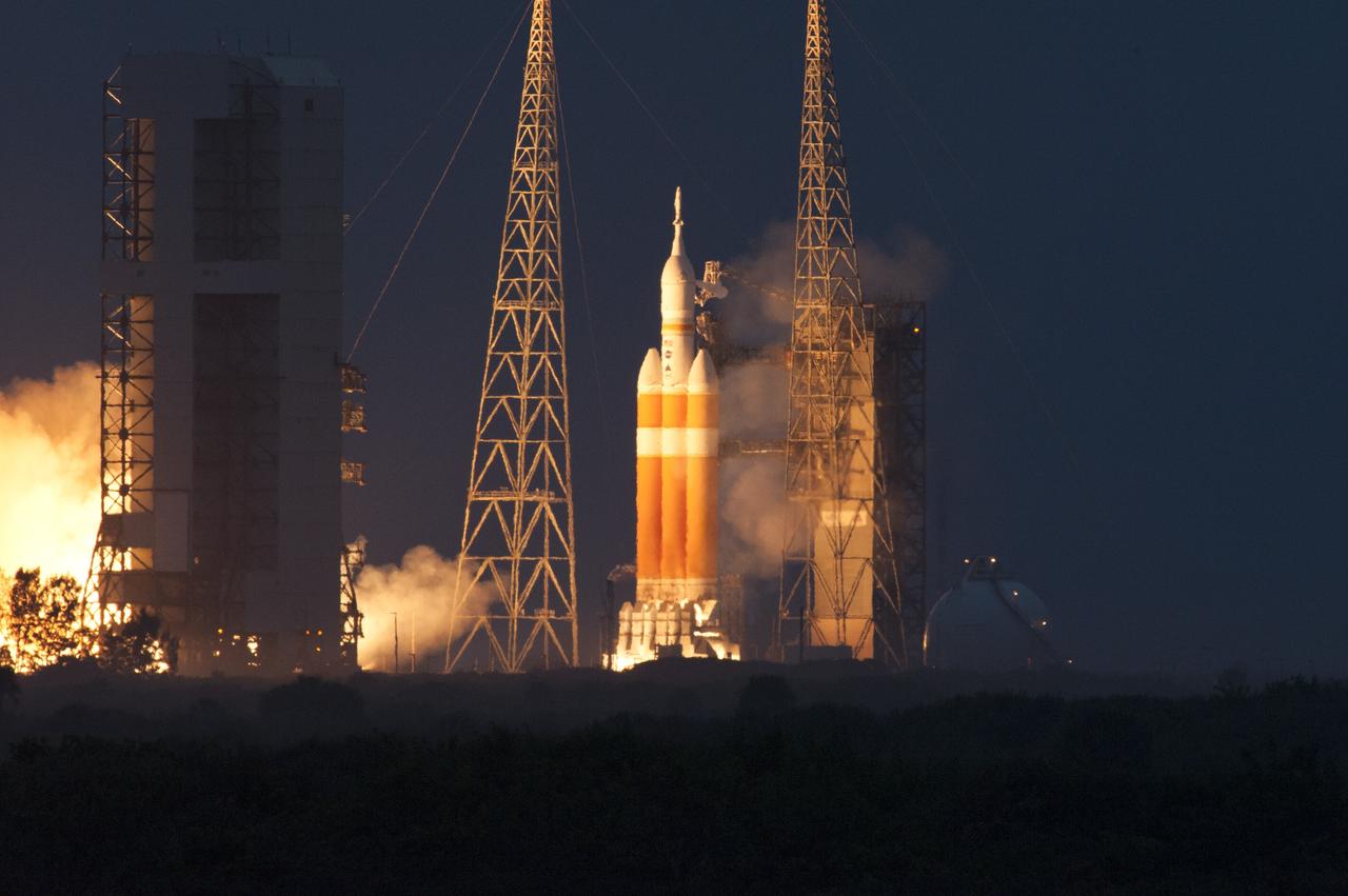 CAPE CANAVERAL, Fla. -- A Delta IV Heavy rocket roars to life at Space Launch Complex 37 at Cape Canaveral Air Force Station in Florida. The launch vehicle is carrying NASA's Orion spacecraft on an unpiloted flight test to Earth orbit. Liftoff was at 7:05 a.m. EST. The flight will send Orion 3,600 miles in altitude beyond the Earth's surface on a four-and-a-half hour mission. Photo credit: NASA/George Roberts