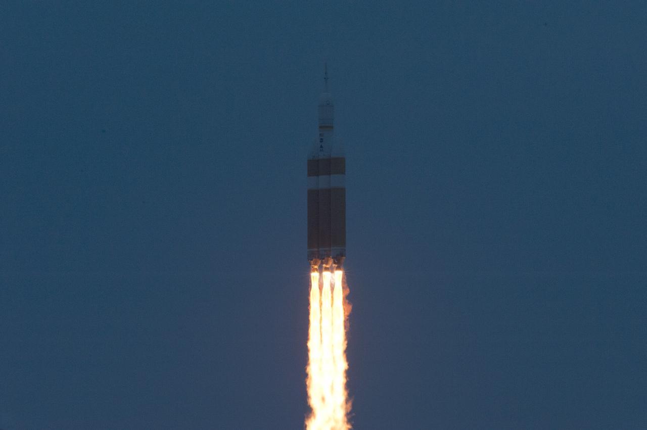CAPE CANAVERAL, Fla. -- A Delta IV Heavy rocket soars after liftoff from Space Launch Complex 37 at Cape Canaveral Air Force Station in Florida carrying NASA's Orion spacecraft on an unpiloted flight test to Earth orbit. Liftoff was at 7:05 a.m. EST. During the two-orbit, four-and-a-half hour mission, engineers will evaluate the systems critical to crew safety, the launch abort system, the heat shield and the parachute system. Photo credit: NASA/George Roberts