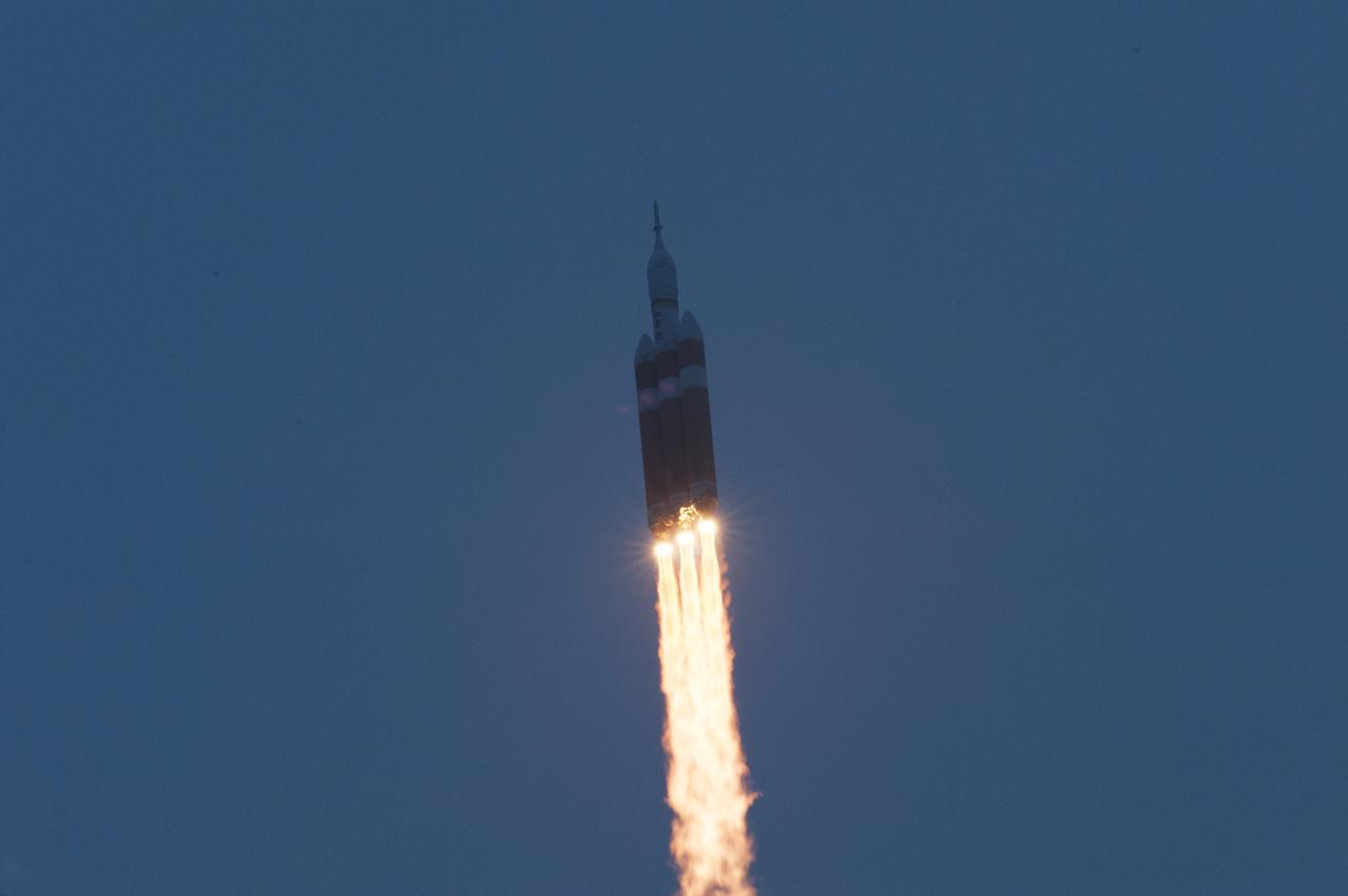 CAPE CANAVERAL, Fla. -- A Delta IV Heavy rocket soars after liftoff from Space Launch Complex 37 at Cape Canaveral Air Force Station in Florida carrying NASA's Orion spacecraft on an unpiloted flight test to Earth orbit. Liftoff was at 7:05 a.m. EST. During the two-orbit, four-and-a-half hour mission, engineers will evaluate the systems critical to crew safety, the launch abort system, the heat shield and the parachute system. Photo credit: NASA/George Roberts