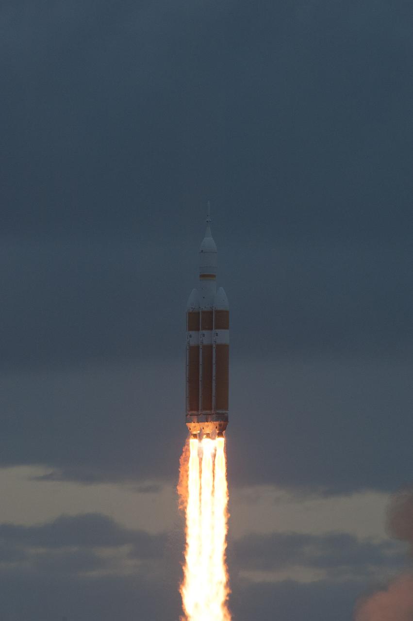 CAPE CANAVERAL, Fla. -- A Delta IV Heavy rocket lifts off from Space Launch Complex 37 at Cape Canaveral Air Force Station in Florida carrying NASA's Orion spacecraft on an unpiloted flight test to Earth orbit. Liftoff was at 7:05 a.m. EST. During the two-orbit, four-and-a-half hour mission, engineers will evaluate the systems critical to crew safety, the launch abort system, the heat shield and the parachute system. For more information, visit www.nasa.gov/orion Photo credit: NASA/Tim Terry