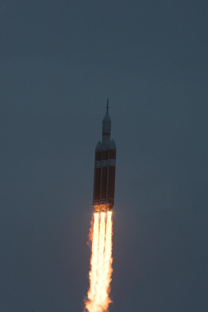 CAPE CANAVERAL, Fla. -- A Delta IV Heavy rocket lifts off from Space Launch Complex 37 at Cape Canaveral Air Force Station in Florida carrying NASA's Orion spacecraft on an unpiloted flight test to Earth orbit. Liftoff was at 7:05 a.m. EST. During the two-orbit, four-and-a-half hour mission, engineers will evaluate the systems critical to crew safety, the launch abort system, the heat shield and the parachute system. For more information, visit www.nasa.gov/orion Photo credit: NASA/Tim Terry