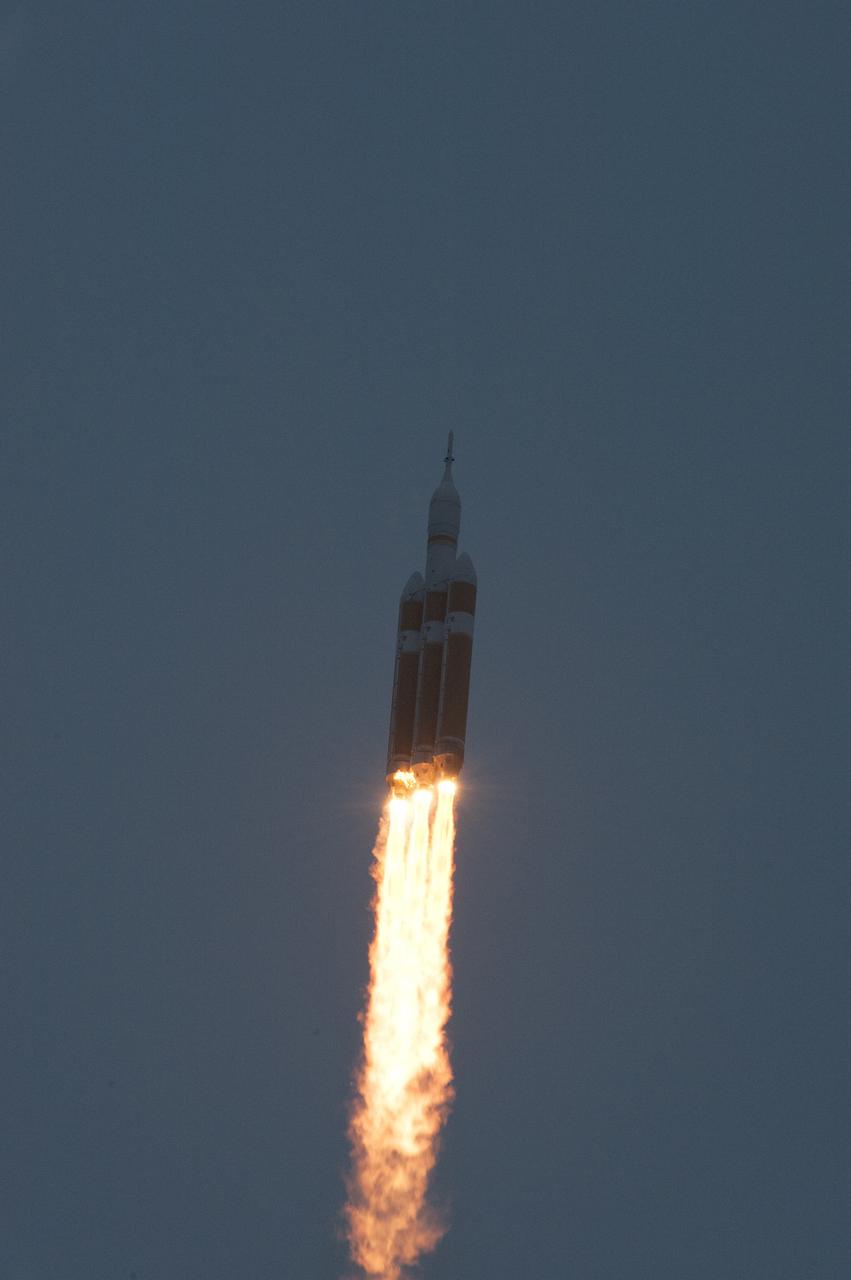 CAPE CANAVERAL, Fla. -- A Delta IV Heavy rocket lifts off from Space Launch Complex 37 at Cape Canaveral Air Force Station in Florida carrying NASA's Orion spacecraft on an unpiloted flight test to Earth orbit. Liftoff was at 7:05 a.m. EST. During the two-orbit, four-and-a-half hour mission, engineers will evaluate the systems critical to crew safety, the launch abort system, the heat shield and the parachute system. For more information, visit www.nasa.gov/orion Photo credit: NASA/Tim Terry