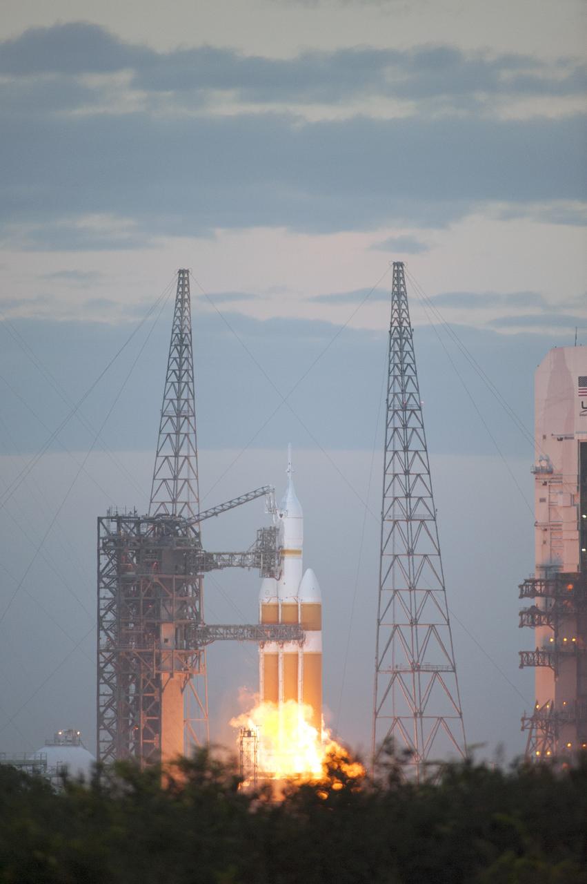 CAPE CANAVERAL, Fla. -- A Delta IV Heavy rocket lifts off from Space Launch Complex 37 at Cape Canaveral Air Force Station in Florida carrying NASA's Orion spacecraft on an unpiloted flight test to Earth orbit. Liftoff was at 7:05 a.m. EST. During the two-orbit, four-and-a-half hour mission, engineers will evaluate the systems critical to crew safety, the launch abort system, the heat shield and the parachute system. For more information, visit www.nasa.gov/orion Photo credit: NASA/Sandra Joseph