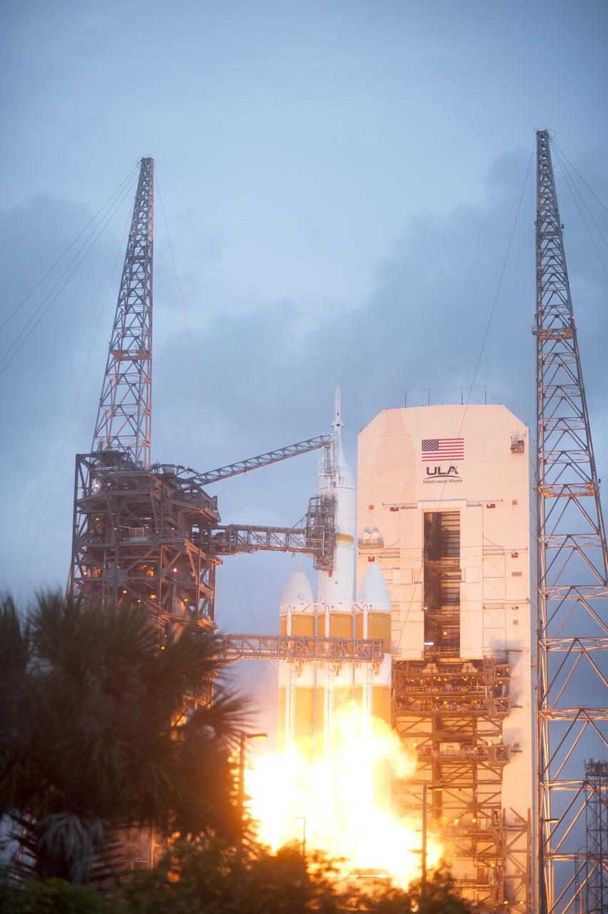 CAPE CANAVERAL, Fla. -- A Delta IV Heavy rocket lifts off from Space Launch Complex 37 at Cape Canaveral Air Force Station in Florida carrying NASA's Orion spacecraft on an unpiloted flight test to Earth orbit. Liftoff was at 7:05 a.m. EST. During the two-orbit, four-and-a-half hour mission, engineers will evaluate the systems critical to crew safety, the launch abort system, the heat shield and the parachute system. For more information, visit www.nasa.gov/orion Photo credit: NASA/ Sandy Joseph/Kevin O’Connell