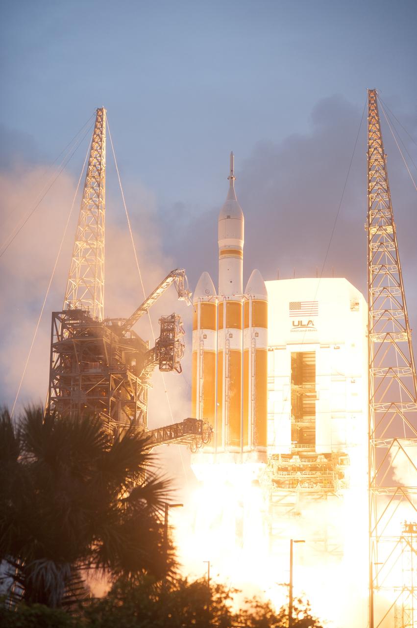 CAPE CANAVERAL, Fla. -- A Delta IV Heavy rocket lifts off from Space Launch Complex 37 at Cape Canaveral Air Force Station in Florida carrying NASA's Orion spacecraft on an unpiloted flight test to Earth orbit. Liftoff was at 7:05 a.m. EST. During the two-orbit, four-and-a-half hour mission, engineers will evaluate the systems critical to crew safety, the launch abort system, the heat shield and the parachute system. For more information, visit www.nasa.gov/orion Photo credit: NASA/ Sandy Joseph/Kevin O’Connell