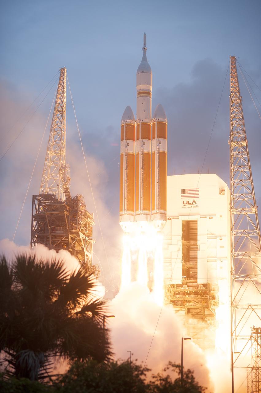 CAPE CANAVERAL, Fla. -- A Delta IV Heavy rocket lifts off from Space Launch Complex 37 at Cape Canaveral Air Force Station in Florida carrying NASA's Orion spacecraft on an unpiloted flight test to Earth orbit. Liftoff was at 7:05 a.m. EST. During the two-orbit, four-and-a-half hour mission, engineers will evaluate the systems critical to crew safety, the launch abort system, the heat shield and the parachute system. For more information, visit www.nasa.gov/orion Photo credit: NASA/ Sandy Joseph/Kevin O’Connell
