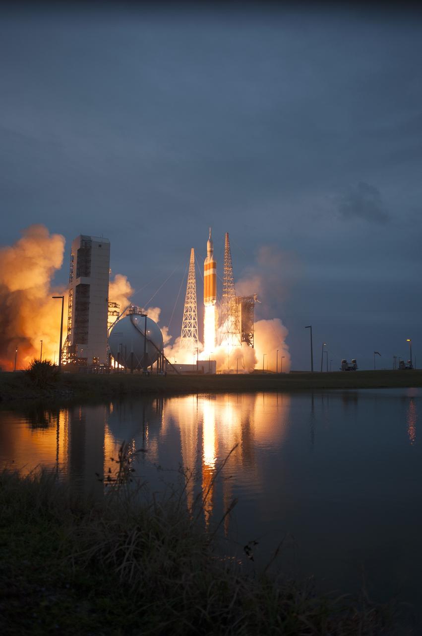 CAPE CANAVERAL, Fla. -- A Delta IV Heavy rocket lifts off from Space Launch Complex 37 at Cape Canaveral Air Force Station in Florida carrying NASA's Orion spacecraft on an unpiloted flight test to Earth orbit. Liftoff was at 7:05 a.m. EST. During the two-orbit, four-and-a-half hour mission, engineers will evaluate the systems critical to crew safety, the launch abort system, the heat shield and the parachute system. For more information, visit www.nasa.gov/orion Photo credit: NASA/ Sandy Joseph/Kevin O’Connell