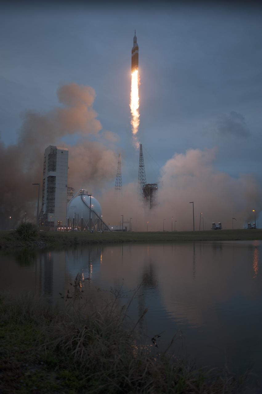 CAPE CANAVERAL, Fla. -- A Delta IV Heavy rocket lifts off from Space Launch Complex 37 at Cape Canaveral Air Force Station in Florida carrying NASA's Orion spacecraft on an unpiloted flight test to Earth orbit. Liftoff was at 7:05 a.m. EST. During the two-orbit, four-and-a-half hour mission, engineers will evaluate the systems critical to crew safety, the launch abort system, the heat shield and the parachute system. For more information, visit www.nasa.gov/orion Photo credit: NASA/ Sandy Joseph/Kevin O’Connell