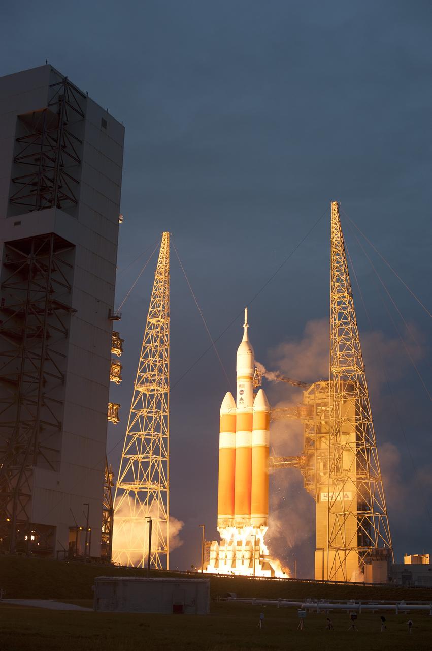 CAPE CANAVERAL, Fla. -- A Delta IV Heavy rocket lifts off from Space Launch Complex 37 at Cape Canaveral Air Force Station in Florida carrying NASA's Orion spacecraft on an unpiloted flight test to Earth orbit. Liftoff was at 7:05 a.m. EST. During the two-orbit, four-and-a-half hour mission, engineers will evaluate the systems critical to crew safety, the launch abort system, the heat shield and the parachute system. For more information, visit www.nasa.gov/orion Photo credit: NASA/Sandra Joseph, Kevin O'Connell