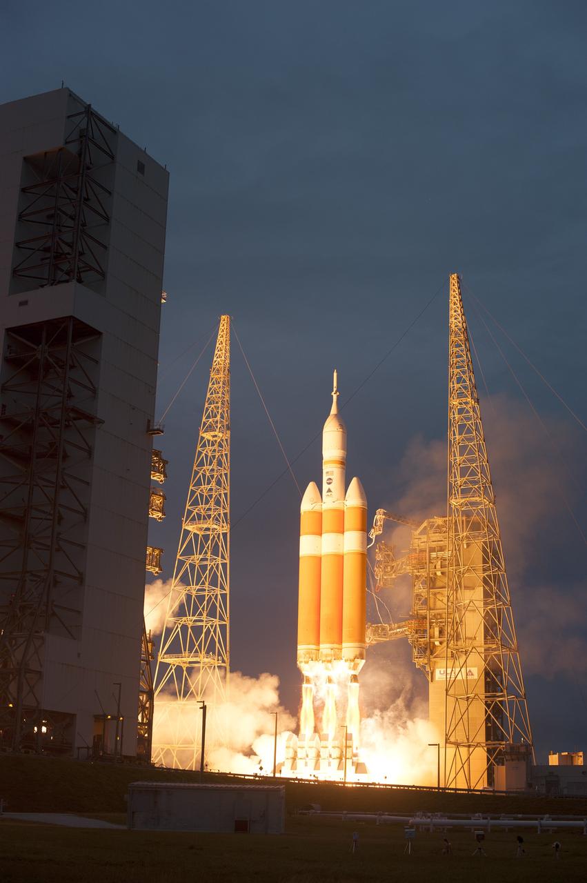 CAPE CANAVERAL, Fla. -- A Delta IV Heavy rocket lifts off from Space Launch Complex 37 at Cape Canaveral Air Force Station in Florida carrying NASA's Orion spacecraft on an unpiloted flight test to Earth orbit. Liftoff was at 7:05 a.m. EST. During the two-orbit, four-and-a-half hour mission, engineers will evaluate the systems critical to crew safety, the launch abort system, the heat shield and the parachute system. For more information, visit www.nasa.gov/orion Photo credit: NASA/Sandra Joseph and Kevin O'Connell