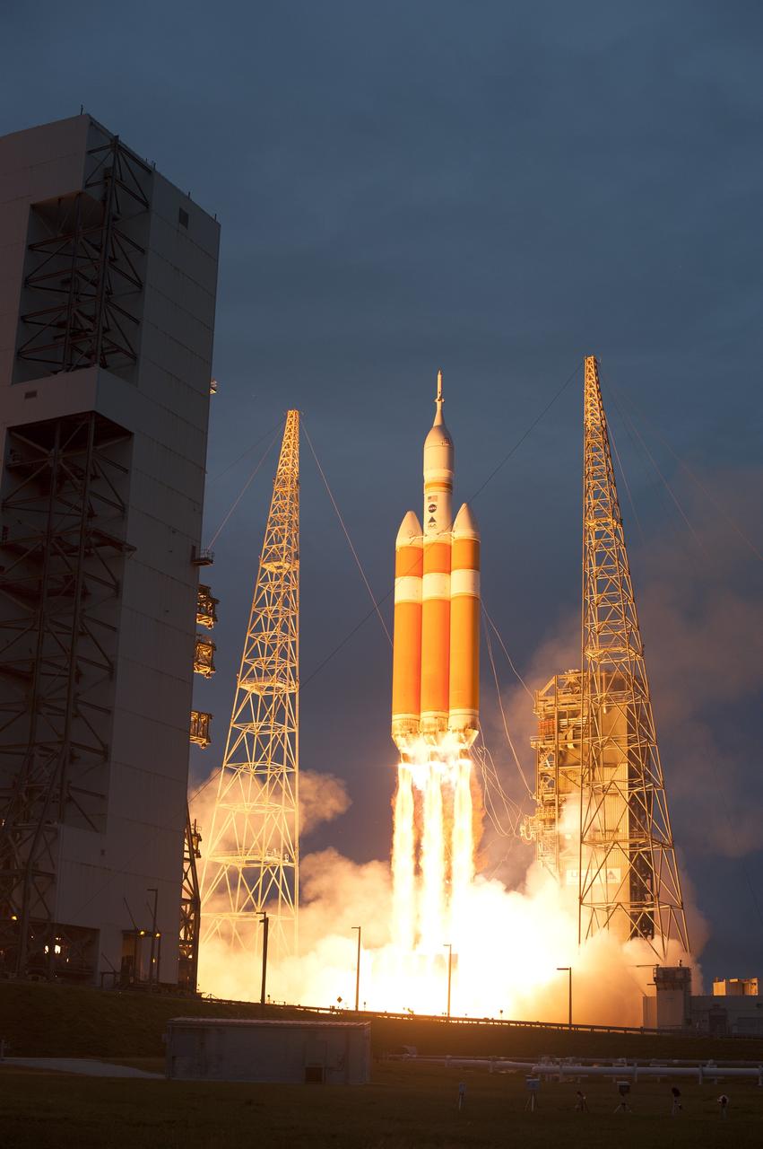 CAPE CANAVERAL, Fla. -- A Delta IV Heavy rocket lifts off from Space Launch Complex 37 at Cape Canaveral Air Force Station in Florida carrying NASA's Orion spacecraft on an unpiloted flight test to Earth orbit. Liftoff was at 7:05 a.m. EST. During the two-orbit, four-and-a-half hour mission, engineers will evaluate the systems critical to crew safety, the launch abort system, the heat shield and the parachute system. For more information, visit www.nasa.gov/orion Photo credit: NASA/Sandra Joseph and Kevin O'Connell