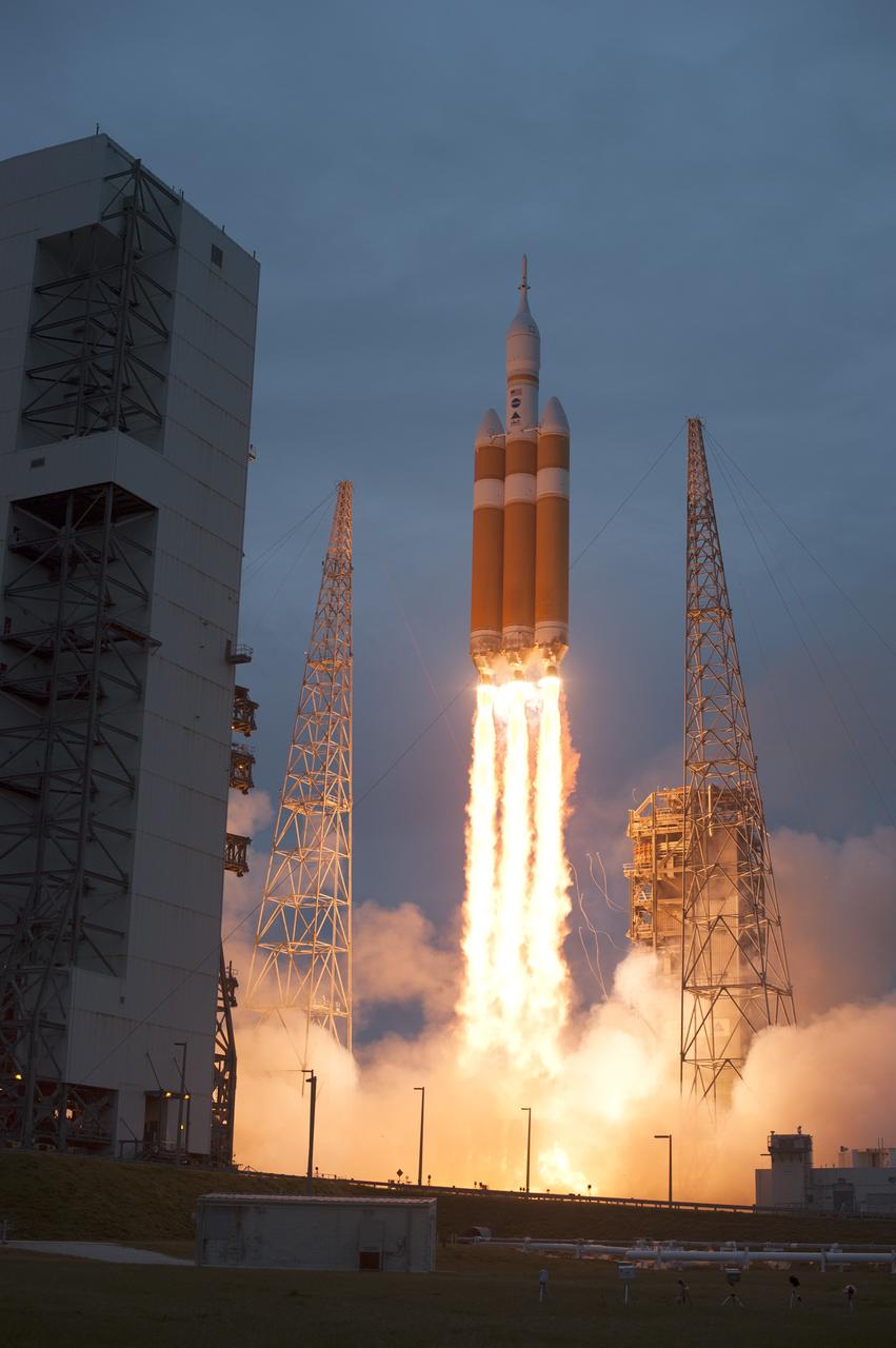 CAPE CANAVERAL, Fla. -- A Delta IV Heavy rocket lifts off from Space Launch Complex 37 at Cape Canaveral Air Force Station in Florida carrying NASA's Orion spacecraft on an unpiloted flight test to Earth orbit. Liftoff was at 7:05 a.m. EST. During the two-orbit, four-and-a-half hour mission, engineers will evaluate the systems critical to crew safety, the launch abort system, the heat shield and the parachute system. For more information, visit www.nasa.gov/orion Photo credit: NASA/Sandra Joseph and Kevin O'Connell