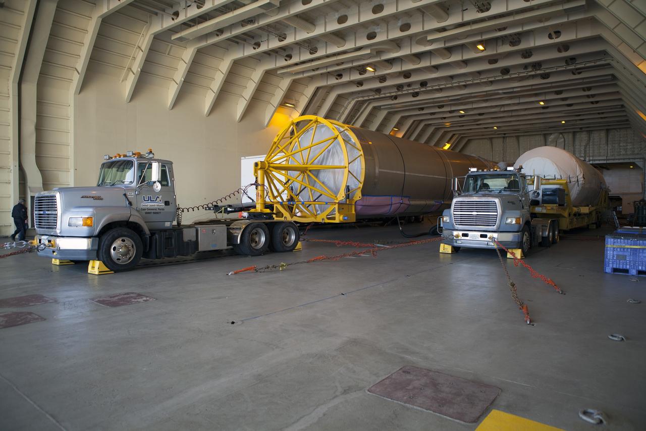CAPE CANAVERAL, Fla. – Trucks inside the United Launch Alliance Delta Mariner prepare to transport the Atlas V rocket and Centaur upper stage that will be used to launch NASA's Magnetospheric Multiscale mission. To learn about the MMS, go to http://go.nasa.gov/1GUbzxb. Photo credit: NASA/Ben Smegelsky