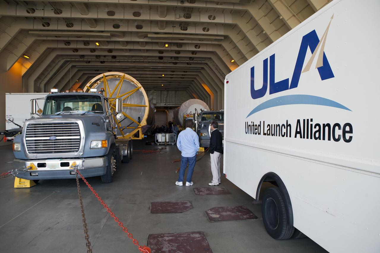 CAPE CANAVERAL, Fla. – Trucks inside the United Launch Alliance Delta Mariner prepare to transport the Atlas V rocket and Centaur upper stage that will be used to launch NASA's Magnetospheric Multiscale mission. To learn about the MMS, go to http://go.nasa.gov/1GUbzxb. Photo credit: NASA/Ben Smegelsky