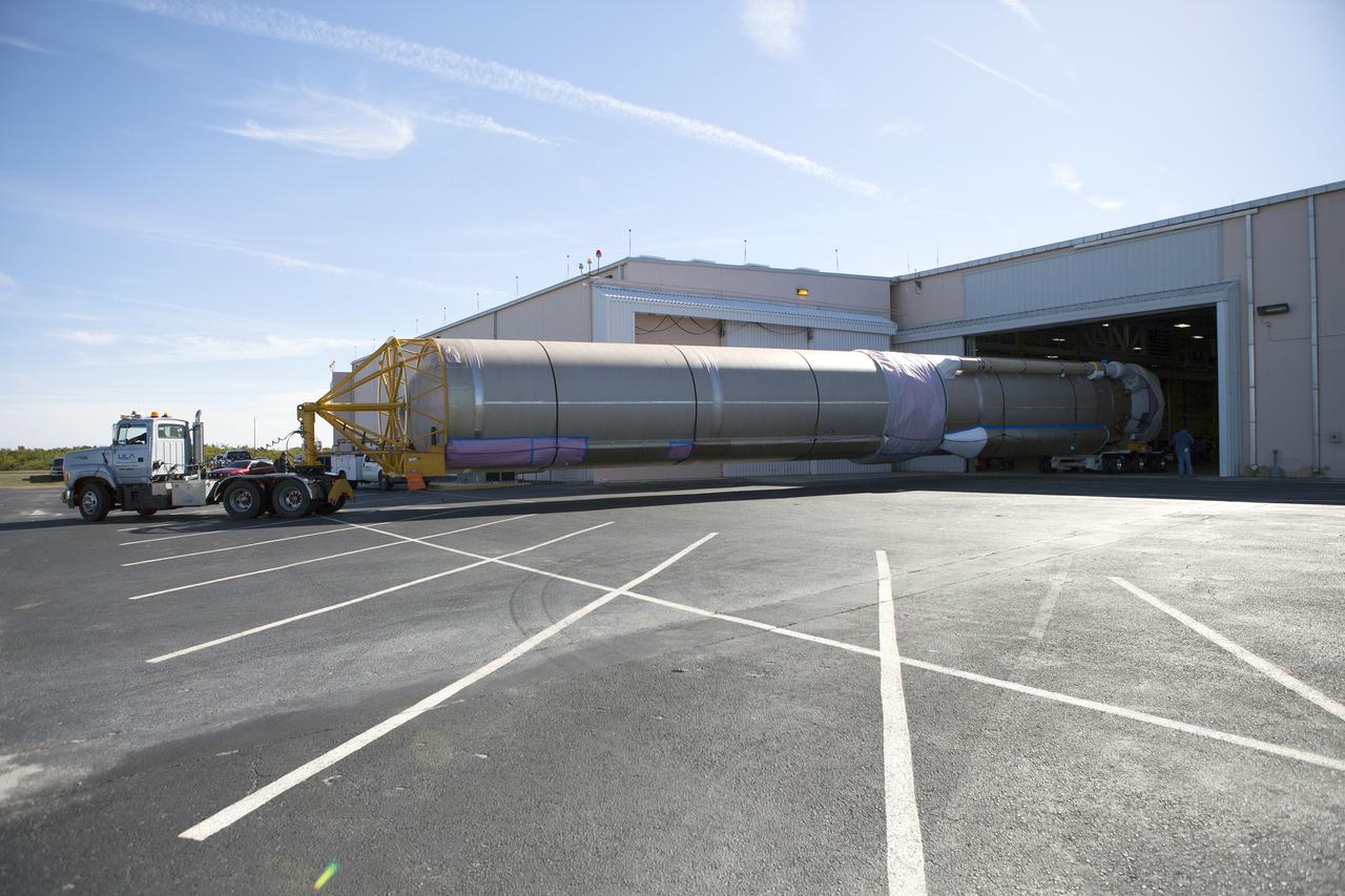 CAPE CANAVERAL, Fla. – A truck positions an Atlas V booster stage inside the hangar at the Atlas V Spaceflight Operations Center at Cape Canaveral Air Force Station. The rocket will be used to launch NASA's Magnetospheric Multiscale mission. To learn about the MMS, go to http://go.nasa.gov/1GUbzxb. Photo credit: NASA/Ben Smegelsky
