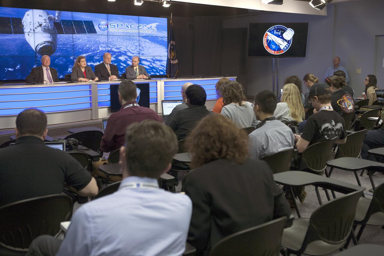CAPE CANAVERAL, Fla. –In the Kennedy Space Center’s Press Site auditorium, agency leaders spoke to members of the news media on the Cloud-Aerosol Transport System. CATS will monitor cloud and aerosol coverage that directly impacts global climate. From left are: Mike Curie of NASA Public Affairs, Julie Robinson, ISS Program chief scientist at NASA’s Johnson Space Center, Robert Swap, program scientist at NASA Headquarters' Earth Science Division, and Matthew McGill, CATS principal investigator at Goddard. Photo credit: NASA/Kim Shiflett