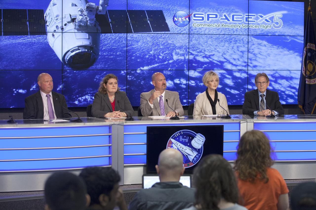 CAPE CANAVERAL, Fla. -- In the Kennedy Space Center’s Press Site auditorium, agency and industry leaders spoke to members of the news media on International Space Station research and technology developments. From left are: Mike Curie of NASA Public Affairs, Julie Robinson, ISS Program chief scientist at NASA’s Johnson Space Center, Kenneth Shields, director of operations and education for the Center for the Advancement of Science in Space, Cheryl Nickerson of Arizona State University, and principal investigator for the Micro-5 experiment, and Samuel Durrance of the Florida Institute of Technology, principal investigator for the NR-SABOL experiment. Photo credit: NASA/ Kim Shiflett