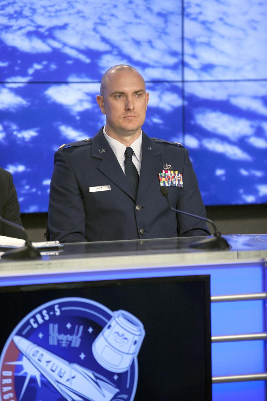 In the Kennedy Space Center’s Press Site auditorium, agency and industry leaders spoke to members of the news media on International Space Station research and technology developments. Participants included Maj. Perry Sweat, U.S. Air Force’s 45th Weather Squadron at Cape Canaveral Air Force Station. Photo credit: NASA/Kim Shiflett