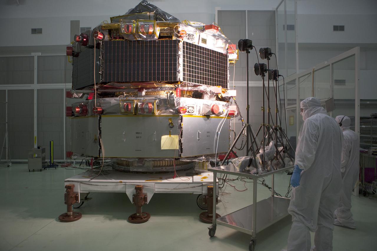 A solar array illumination test is performed on the upper stack of the Magnetospheric Multiscale spacecraft, or MMS, in the Astrotech payload processing facility in Titusville, Florida, near Kennedy Space Center. Illumination testing of the lower instrumentation payload stack was completed in December. Launch aboard a United Launch Alliance Atlas V rocket from Space Launch Complex 41 on Cape Canaveral Air Force Station is targeted for March 12. To learn more about MMS, visit http://www.nasa.gov/mms.  Photo credit: NASA/Kim Shiflett