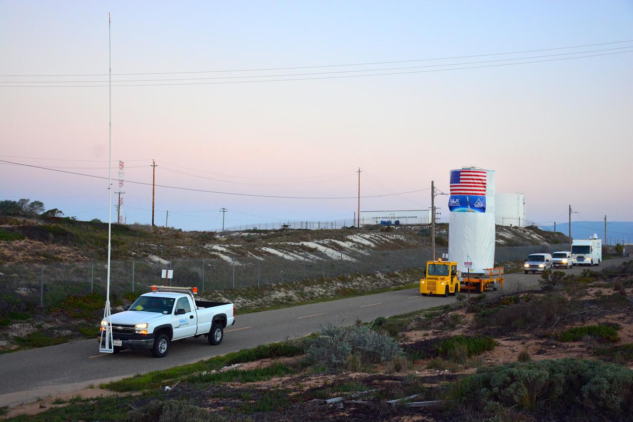 VANDENBERG AIR FORCE BASE, Calif. – At Vandenberg Air Force Base in California, NASA's Soil Moisture Active Passive mission, or SMAP, satellite is transported to Space Launch Complex 2 where it will be mated to a Delta II rocket.    SMAP will provide global measurements of soil moisture and its freeze/thaw state. These measurements will be used to enhance understanding of processes that link the water, energy and carbon cycles, and to extend the capabilities of weather and climate prediction models. SMAP data also will be used to quantify net carbon flux in boreal landscapes and to develop improved flood prediction and drought monitoring capabilities. Launch is scheduled for Jan. 29, 2015. To learn more about SMAP, visit http://smap.jpl.nasa.gov Photo credit: NASA/Randy Beaudoin