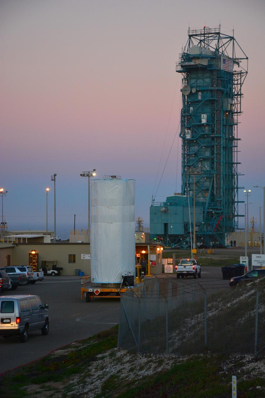 VANDENBERG AIR FORCE BASE, Calif. – At Vandenberg Air Force Base in California, NASA's Soil Moisture Active Passive mission, or SMAP, satellite is transported to Space Launch Complex 2 where it will be mated to a Delta II rocket.    SMAP will provide global measurements of soil moisture and its freeze/thaw state. These measurements will be used to enhance understanding of processes that link the water, energy and carbon cycles, and to extend the capabilities of weather and climate prediction models. SMAP data also will be used to quantify net carbon flux in boreal landscapes and to develop improved flood prediction and drought monitoring capabilities. Launch is scheduled for Jan. 29, 2015. To learn more about SMAP, visit http://smap.jpl.nasa.gov Photo credit: NASA/Randy Beaudoin