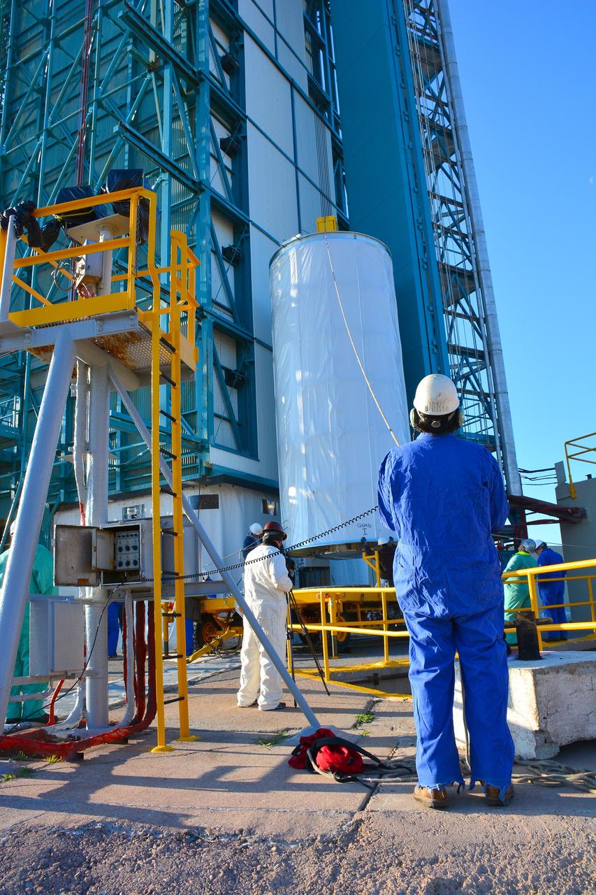VANDENBERG AIR FORCE BASE, Calif. – At Vandenberg Air Force Base in California, NASA's Soil Moisture Active Passive mission, or SMAP, satellite is prepared for lifting at Space Launch Complex 2 for mating to its Delta II rocket.    SMAP will provide global measurements of soil moisture and its freeze/thaw state. These measurements will be used to enhance understanding of processes that link the water, energy and carbon cycles, and to extend the capabilities of weather and climate prediction models. SMAP data also will be used to quantify net carbon flux in boreal landscapes and to develop improved flood prediction and drought monitoring capabilities. Launch is scheduled for Jan. 29, 2015. To learn more about SMAP, visit http://smap.jpl.nasa.gov Photo credit: NASA/Randy Beaudoin