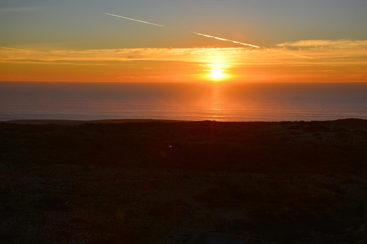 VANDENBERG AIR FORCE BASE, Calif. – The sun sets over the Pacific Ocean as seen from Vandenberg Air Force Base in California where NASA's Soil Moisture Active Passive mission, or SMAP, satellite is being prepared for liftoff from Space Launch Complex 2.    SMAP will provide global measurements of soil moisture and its freeze/thaw state. These measurements will be used to enhance understanding of processes that link the water, energy and carbon cycles, and to extend the capabilities of weather and climate prediction models. SMAP data also will be used to quantify net carbon flux in boreal landscapes and to develop improved flood prediction and drought monitoring capabilities. Launch is scheduled for Jan. 29, 2015. To learn more about SMAP, visit http://smap.jpl.nasa.gov Photo credit: NASA/Randy Beaudoin