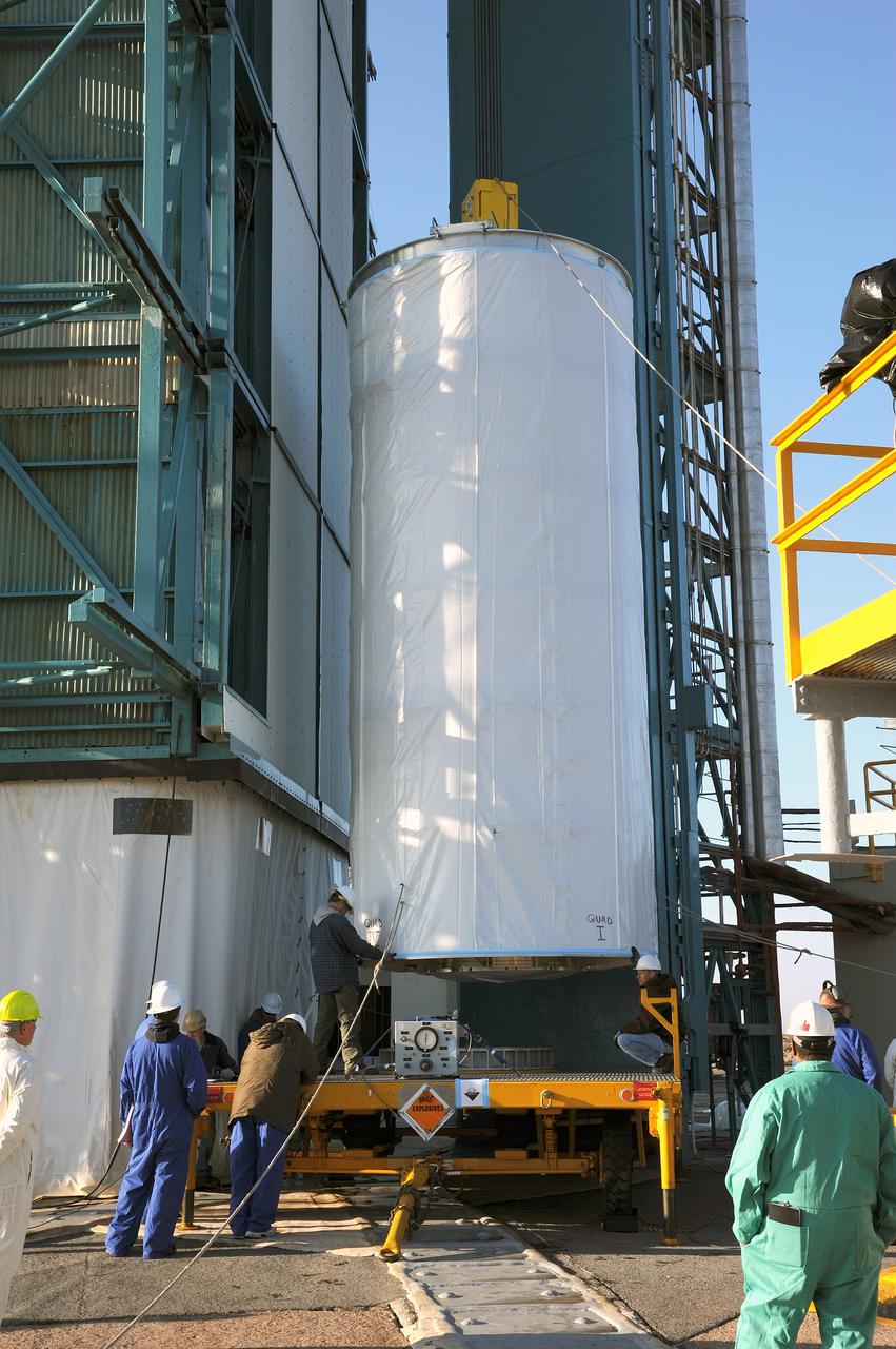 VANDENBERG AFB, California – Technicians and engineers begin lifting NASA's SMAP spacecraft to the top of a Delta II rocket at Space Launch Complex-2 for launch. For more, go to www.nasa.gov/smap Photo credit: USAF