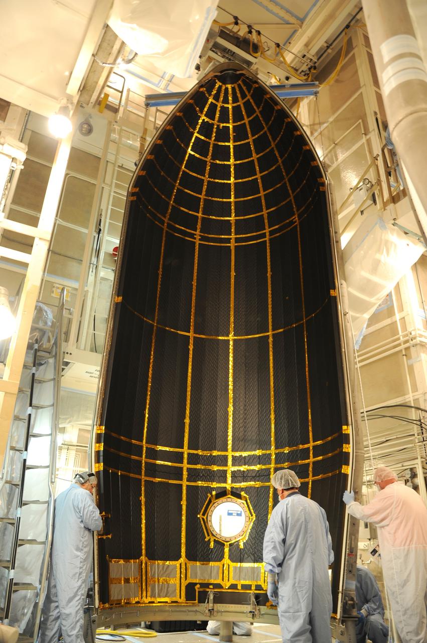 VANDENBERG AFB, California – The payload fairing is moved into place around NASA's SMAP spacecraft inside the service structure at Space Launch Complex-2 at Vandenberg AFB, California - the launch site for NASA's SMAP spacecraft. For more, go to www.nasa.gov/smap Photo credit: USAF