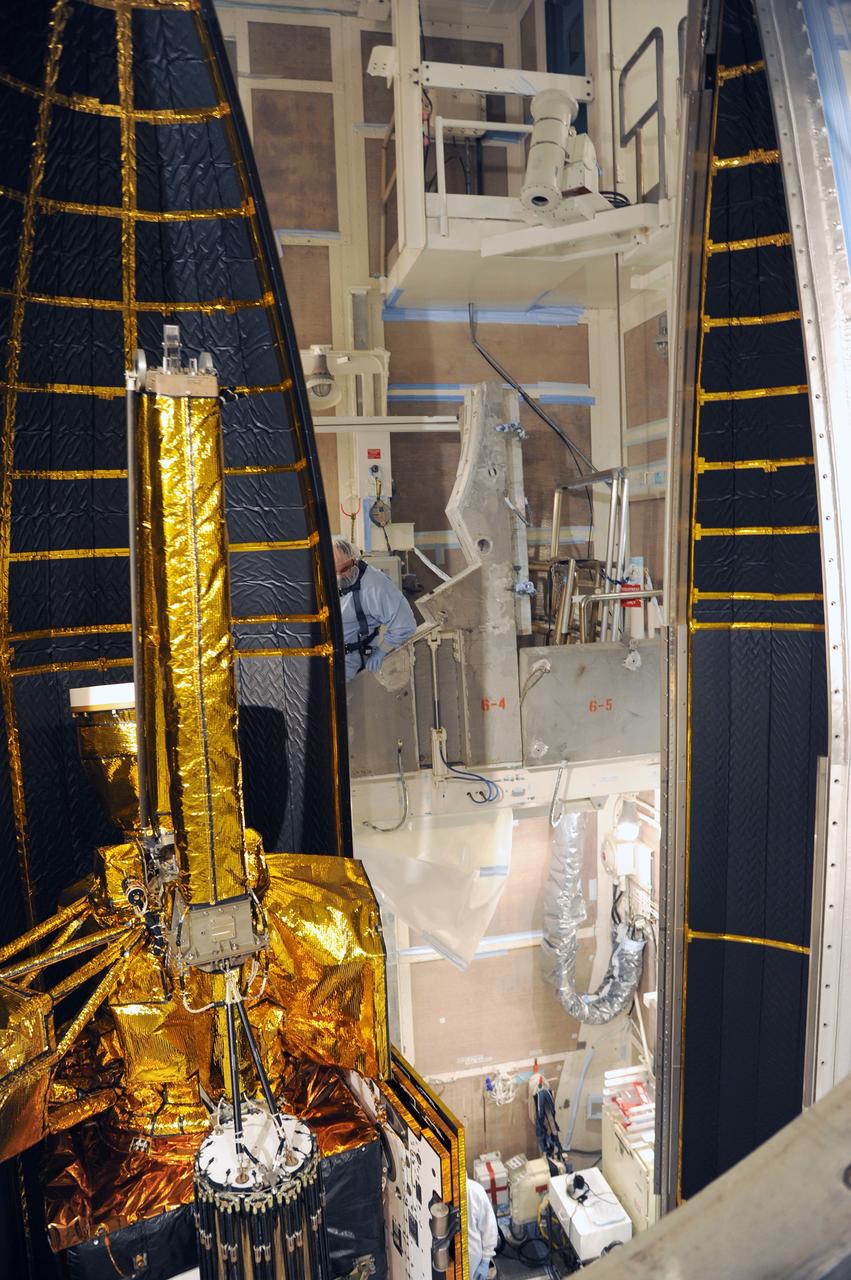 VANDENBERG AFB, California – The payload fairing is moved into place around NASA's SMAP spacecraft inside the service structure at Space Launch Complex-2 at Vandenberg AFB, California - the launch site for NASA's SMAP spacecraft. For more, go to www.nasa.gov/smap Photo credit: USAF