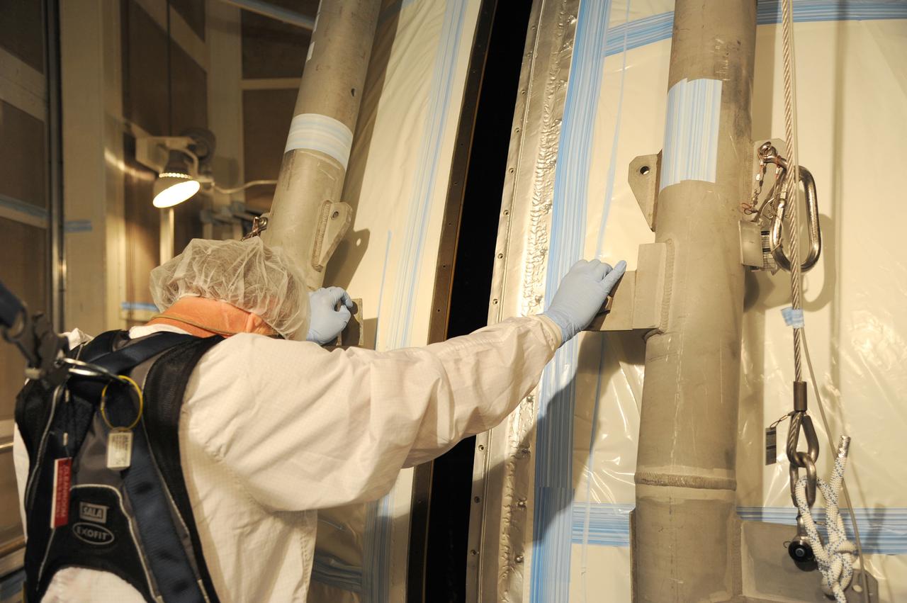 VANDENBERG AFB, California – The payload fairing is moved into place around NASA's SMAP spacecraft inside the service structure at Space Launch Complex-2 at Vandenberg AFB, California - the launch site for NASA's SMAP spacecraft. For more, go to www.nasa.gov/smap Photo credit: USAF