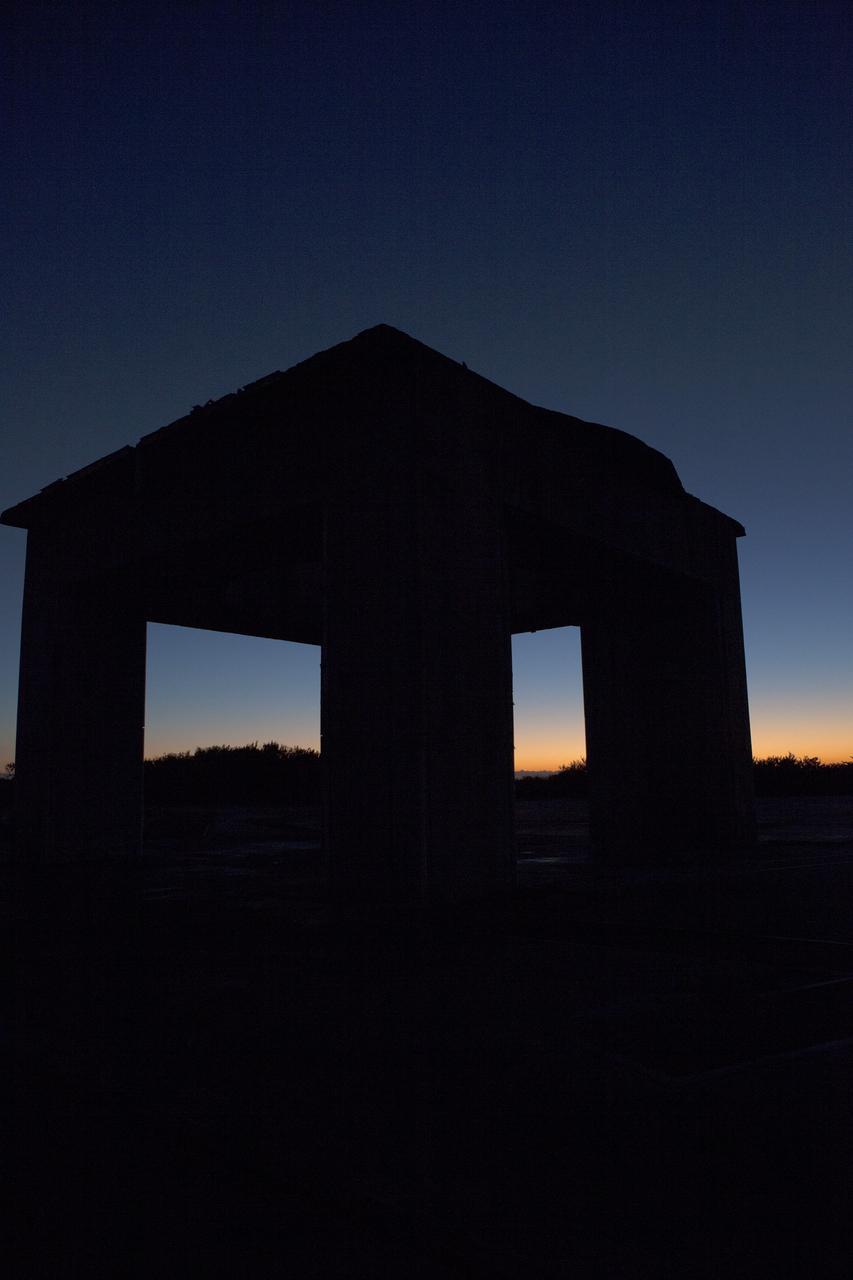 CAPE CANAVERAL, Fla. – Sunrise at Launch Pad 34 on Cape Canaveral Air Force Station in Florida illuminates what remains of the pad's historic gantry.     On this day in 1967, a fire erupted on the pad during a preflight test, taking the lives of the Apollo 1 crew, NASA astronauts Virgil Grissom, Edward White and Roger Chaffee. To learn more about Apollo 1 and the crew, visit http://www.nasa.gov/mission_pages/apollo/missions/apollo1.html.  Photo credit: NASA/Ben Smegelsky