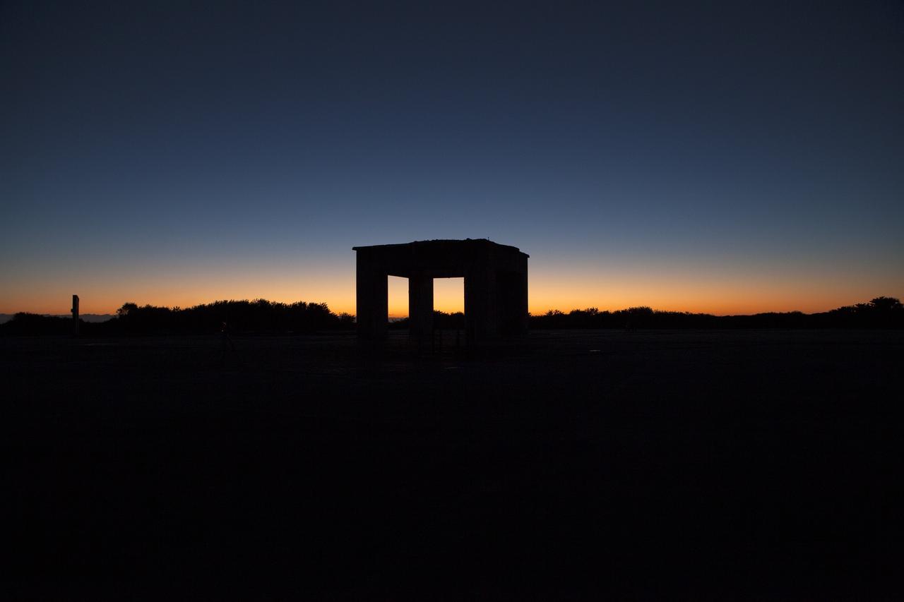 CAPE CANAVERAL, Fla. – Sunrise at Launch Pad 34 on Cape Canaveral Air Force Station in Florida silhouettes what remains of the pad's historic gantry.    On this day in 1967, a fire erupted on the pad during a preflight test, taking the lives of the Apollo 1 crew, NASA astronauts Virgil Grissom, Edward White and Roger Chaffee. To learn more about Apollo 1 and the crew, visit http://www.nasa.gov/mission_pages/apollo/missions/apollo1.html.  Photo credit: NASA/Ben Smegelsky