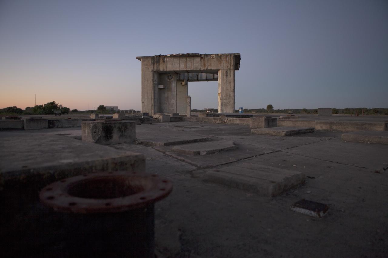 CAPE CANAVERAL, Fla. – Sunrise over Launch Pad 34 on Cape Canaveral Air Force Station in Florida reveals only remnants of the concrete and steel of the once majestic launch gantry.    On this day in 1967, a fire erupted on the pad during a preflight test, taking the lives of the Apollo 1 crew, NASA astronauts Virgil Grissom, Edward White and Roger Chaffee. To learn more about Apollo 1 and the crew, visit http://www.nasa.gov/mission_pages/apollo/missions/apollo1.html.  Photo credit: NASA/Ben Smegelsky