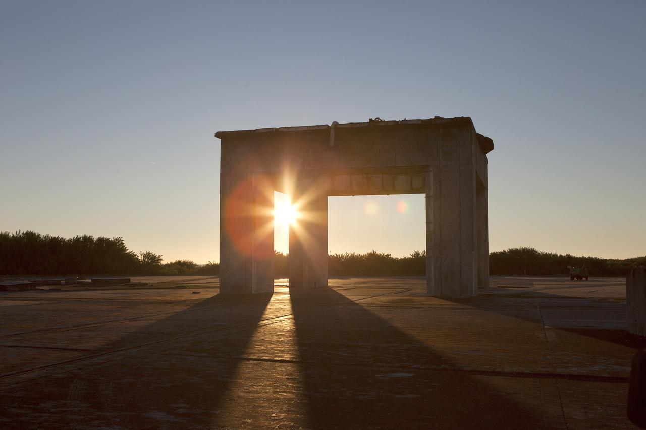 CAPE CANAVERAL, Fla. – The sun beams through what remains of the gantry on Launch Pad 34 on Cape Canaveral Air Force Station in Florida.      On this day in 1967, a fire erupted on the pad during a preflight test, taking the lives of the Apollo 1 crew, NASA astronauts Virgil Grissom, Edward White and Roger Chaffee. To learn more about Apollo 1 and the crew, visit http://www.nasa.gov/mission_pages/apollo/missions/apollo1.html.  Photo credit: NASA/Ben Smegelsky