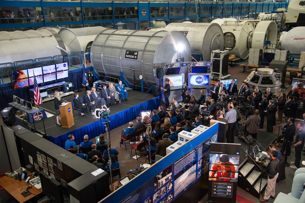 HOUSTON, Texas - jsc2015e031268 - HOUSTON, Texas - NASA's Stephanie Schierholz opens a presentation about the agency's Commercial Crew Program highlighting key development activities, test plans and objectives for achieving certification of two American crew transportation systems with Dr. Ellen Ochoa, director of NASA's Johnson Space Center in Houston, NASA Administrator Charlie Bolden, Commercial Crew Program Manager Kathy Lueders, Boeing Space Exploration Vice President and General Manager John Elbon, SpaceX President and Chief Operating Officer Gwynne Shotwell and NASA Astronaut Mike Fincke. Photo credit: NASA/Robert Markowitz