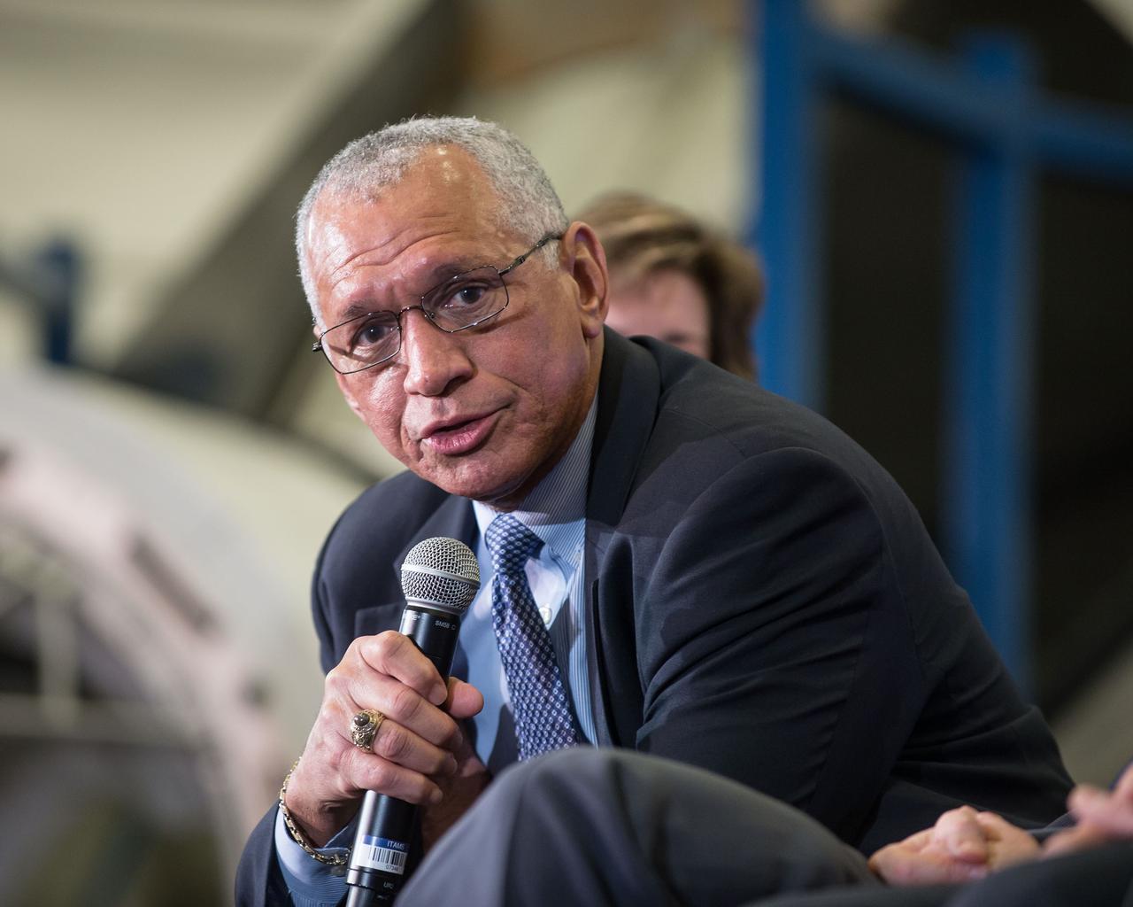 HOUSTON, Texas- jsc2015e031278 - NASA Administrator Charles Bolden discusses the agency's Commercial Crew Program during a presentation highlighting key development activities, test plans and objectives for achieving certification of two American crew transportation systems with Commercial Crew Program Manager Kathy Lueders, Boeing Space Exploration Vice President and General Manager John Elbon, Space X President and Chief Operating Officer Gwynne Shotwell and NASA Astronaut Mike Fincke. Photo credit: NASA/Robert Markowitz