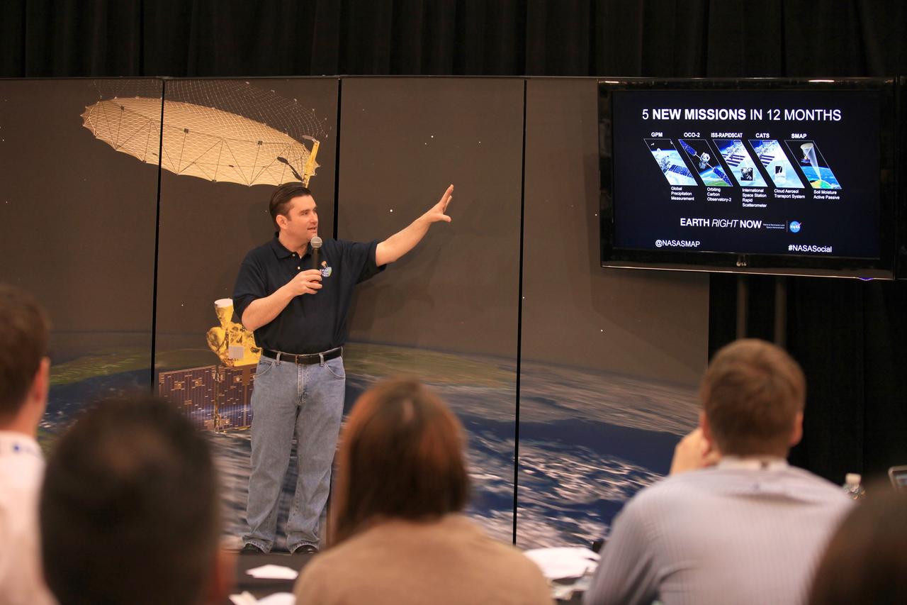VANDENBERG AIR FORCE BASE, Calif. – Jared Entin, program scientist for NASA's Soil Moisture Active Passive mission, or SMAP, discusses the science and engineering of the mission with the audience of a NASA Social held at Vandenberg Air Force Base in California. This NASA Social brought together mission scientists and engineers with an audience of 70 students, educators, social media managers, bloggers, photographers and videographers who were selected from a pool of 325 applicants from 45 countries to participate in launch activities and communicate their experience with social media followers. The SMAP mission is scheduled to launch from Vandenberg on Jan. 29. To learn more about SMAP, visit http://www.nasa.gov/smap. Photo credit: NASA/Kim Shiflett